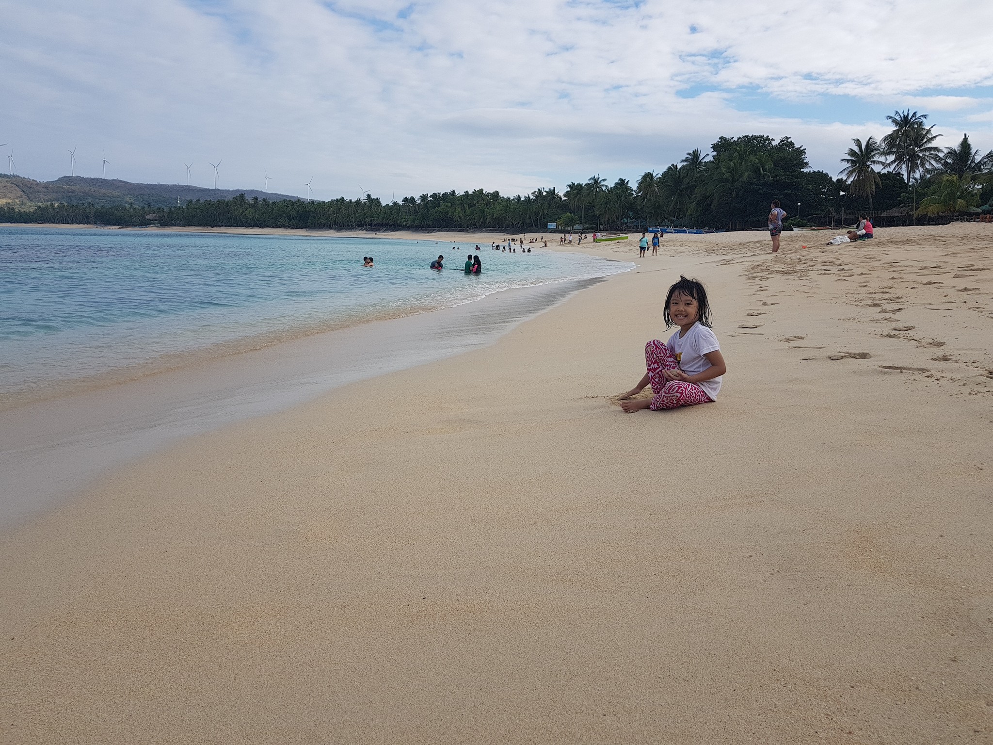 a child at pagudpud beach