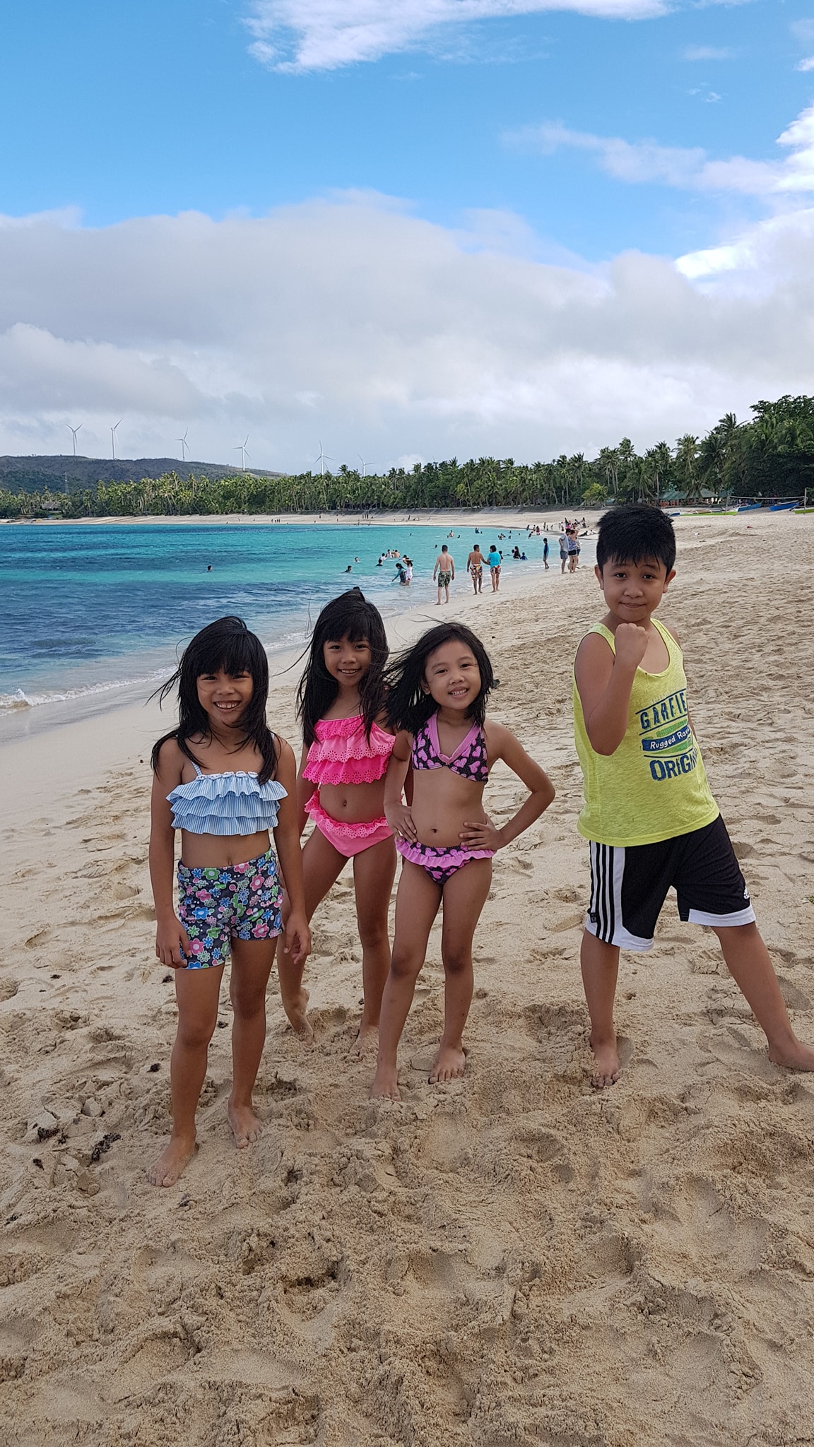 kids posing at pagudpud beach