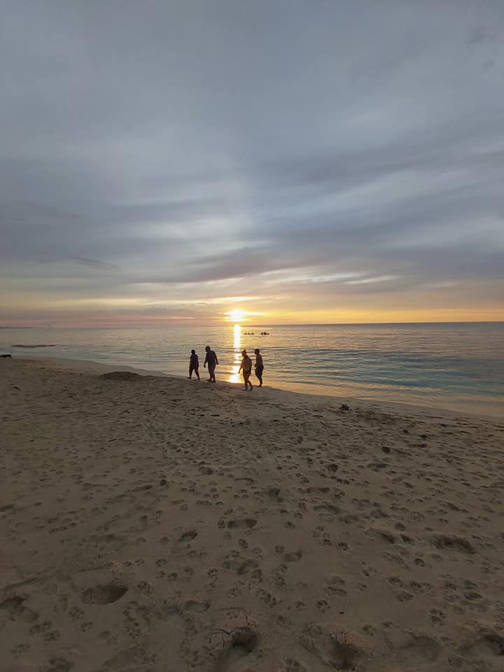 walking during sunset at saud beach