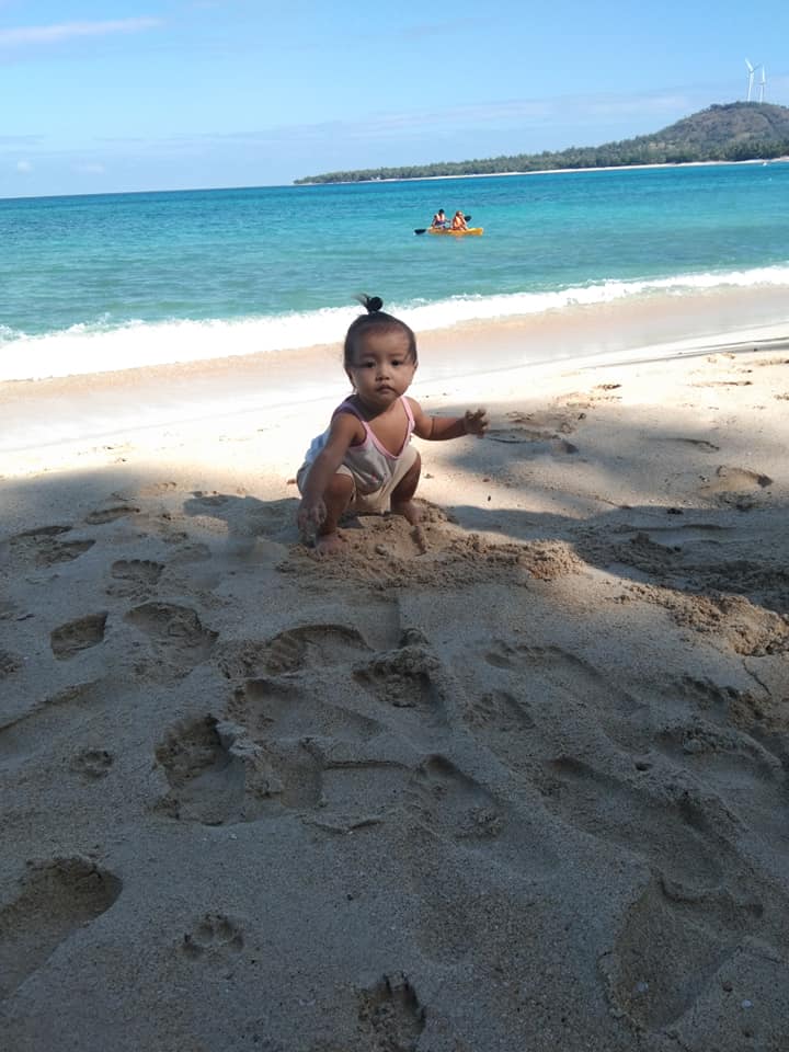 a toddler on saud beach